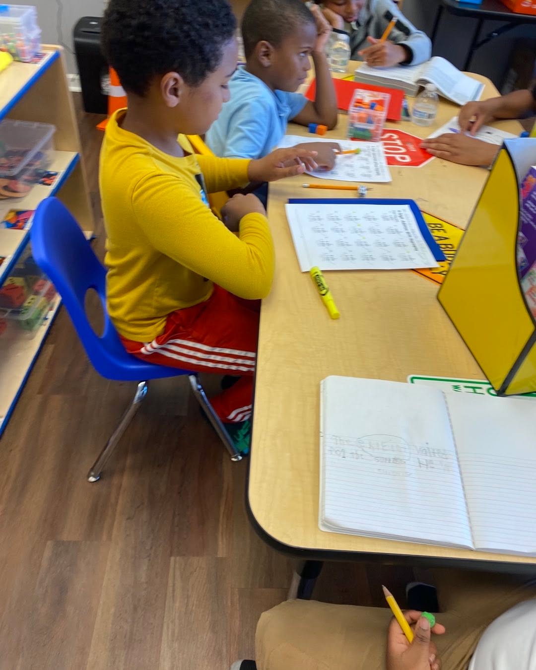 Students working on worksheets